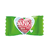 Herzförmiges Bonbon mit dem Aufdruck "Danke" in mehreren Sprachen auf grünem Wrapper.