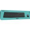 Tastatur-Maus-Set in Verpackung mit USB-Empfänger auf türkisem Hintergrund.