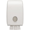 Weißer Handtuchspender mit runder Öffnung für Format-Handtücher und schlankem, modernem Design.