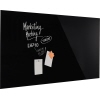 Schwarzes Glasboard mit Notizen und handschriftlicher Beschriftung, zur Wandmontage geeignet.