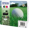 Tintenpatronen-Multipack in Schwarz, Cyan, Magenta und Gelb auf Rasen neben einem Golfball.