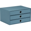 Dreischubladenbox in Denimfarbe mit strukturierter Oberfläche und runden Griffen.