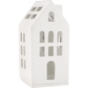 Weißer Teelichthalter in Form eines Hauses mit Fenster- und Türausschnitten.