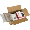 Paket mit Luftpolsterkissen und einem Kartonprodukt in einer offenen Schachtel.