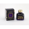 Flasche mit Diamine Tinte 'Purple Rain' neben der entsprechenden Verpackung.