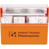 Oranger Pflasterspender mit verschiedenen Größen von aluderm®-aluplast Wundpflaster im Inneren.