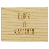 Holzkästchen mit Lasergravur "Glück im Kästchen" auf der Vorderseite.