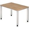 Schreibtisch mit nussbaumfarbener Tischplatte und weißen Beinen, Maße 1200 x 800 mm.