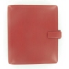 Rotes, klassisches Filofax Timer Metropol in geschlossener Ansicht mit Druckverschluss.
