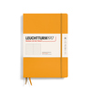 Gelbes Hardcover-Notizbuch im DIN B5-Format mit punktkariertem Papier und zwei Lesezeichen.
