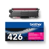 Magenta Tonerkassette TN-426M von Brother über schwarzer Verpackung auf hellem Hintergrund.