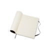 Schwarzes Moleskine Notizbuch Classic Softcover XL, offen mit blanko Seiten.