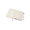 Offenes Moleskine Notizbuch Classic Softcover XL in schwarz, mit leeren Seiten und Innentasche.