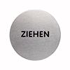 Rundes Türschild aus Metall mit der Aufschrift "ZIEHEN" in schwarzer Schrift.
