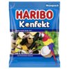 Bunte Tüte mit HARIBO Lakritz Konfekt und Abbildung eines Papageis sowie Kokosnuss.