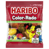 Bunte Tüte mit HARIBO Color-Rado Fruchtgummis und verschiedenen Süßwaren-Motiven.