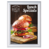 Bilderwechselrahmen in Silberrahmen mit einem Menü für Burger gerahmt.