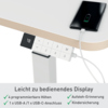 Elektrisch höhenverstellbarer Schreibtisch mit Bedienungselement und Smartphone-Ladeanschluss.
