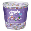 Bunte Verpackung mit Mini-Täfelchen von Milka in einem transparenten Behälter.