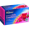 Kartonverpackung mit Meßmer Tee Kanadische Süße Cranberry und einer Tasse Tee.