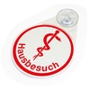 Hinweisschild mit Äskulapstab und dem Wort "Hausbesuch" in rotem Kreis.