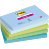 Fünf Stapel in verschiedenen Blau- und Grüntönen von Post-it® Super Sticky Notes.