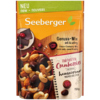 Packung mit Nussmischung Genuss-Mix, Cranberries und Cashews in Zartbitterschokolade.