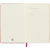Offene Ausgabe eines scharlachroten Moleskine Buchkalenders mit leeren Seiten.