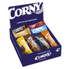 Thekendisplay mit verschiedenen Sorten von Corny Müsliriegeln in einer offenen Schachtel.