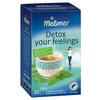 Packung von Meßmer Tee "Detox your feelings" mit einer Tasse Tee und Kräutern auf dem Bild.