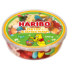 Runde Box mit bunten Fruchtgummis in verschiedenen Formen, beschriftet mit 'HARIBO Osternkörbchen'.