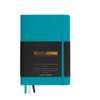 Türkises Notizbuch der Bullet Journal Edition 2 mit schwarzem Umschlag und Band.