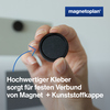 Schwarzer Ergo-Magnet in Hand, mit Fokus auf der Kunststoffkappe und Hinweis zum Kleber.