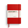 Rotes Hardcover-Notizbuch mit punktkarierten Seiten und einem schlichten, weißen Etikett.