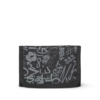 Geldbörse in Schwarz mit Graffiti-Muster und Klappdesign, für Geld und Münzen.