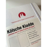 Weißes DIN A5 Notizbuch mit punktkariertem Innenteil und Prägung "op kölsch".
