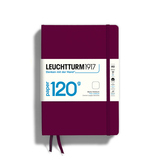 Rotweinfarbenes Notizbuch im DIN A5 Format mit einem weißen Etikett und Gummiband.