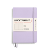 Lila Notizbuch mit Softcover, Punktkariert, A5, mit sichtbarem Etikett.