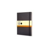 Schwarzes Moleskine Notizbuch Classic Softcover XL mit linierter Seiten und Gummiband.