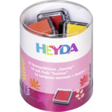 Drei Stempelkissen in einem runden Behälter mit Aufschrift und bunten Farben.