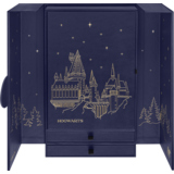 Limitierte Sammlerbox mit Hogwarts-Motiv und goldenen Sternen, geöffnet, enthält ein Notizbuch.