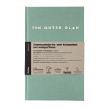 Buchkalender in seegrüner Farbe mit einem Aufkleber, der die Funktionen beschreibt.