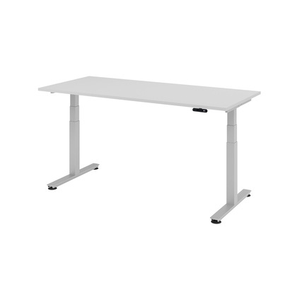 Grauer Schreibtisch mit elektrisch höhenverstellbarem Gestell und Memoryschalter.