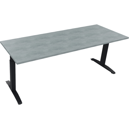 Schreibtisch mit einer hellgrünen Betonoberfläche und schwarzen Flachkufen aus Quadratrohr.