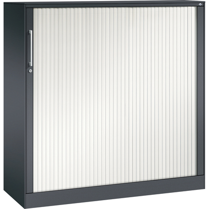 Schwarzer Rollladenschrank mit Kunststoff-Lamellentür und Aluminium-Schlossleiste.