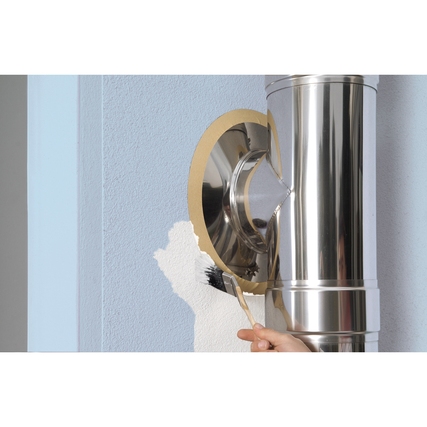 Kreppband zum Abkleben von Kurven wird neben einem runden Metallobjekt in Anwendung gezeigt.