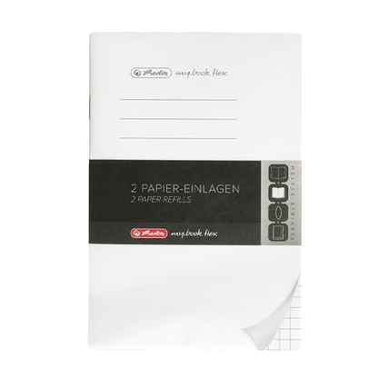 Zwei papierene Einlagen für ein Notizbuch im DIN A6 Format, kariert und verpackt.