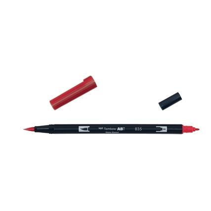 Aquarellierbarer Pinselstift mit zwei Spitzen in rot, Kappe entfernt.