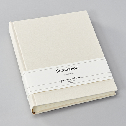 Weißes Fotoalbum mit Buchleinen und einem schmalen Band, beschriftet mit "forever and ever".