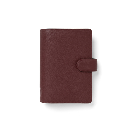 Brauner, genarbter Organizer mit Druckknopfverschluss in seitlicher Ansicht.